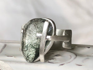 Moss and cross ring