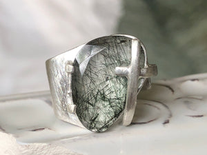 Moss and cross ring